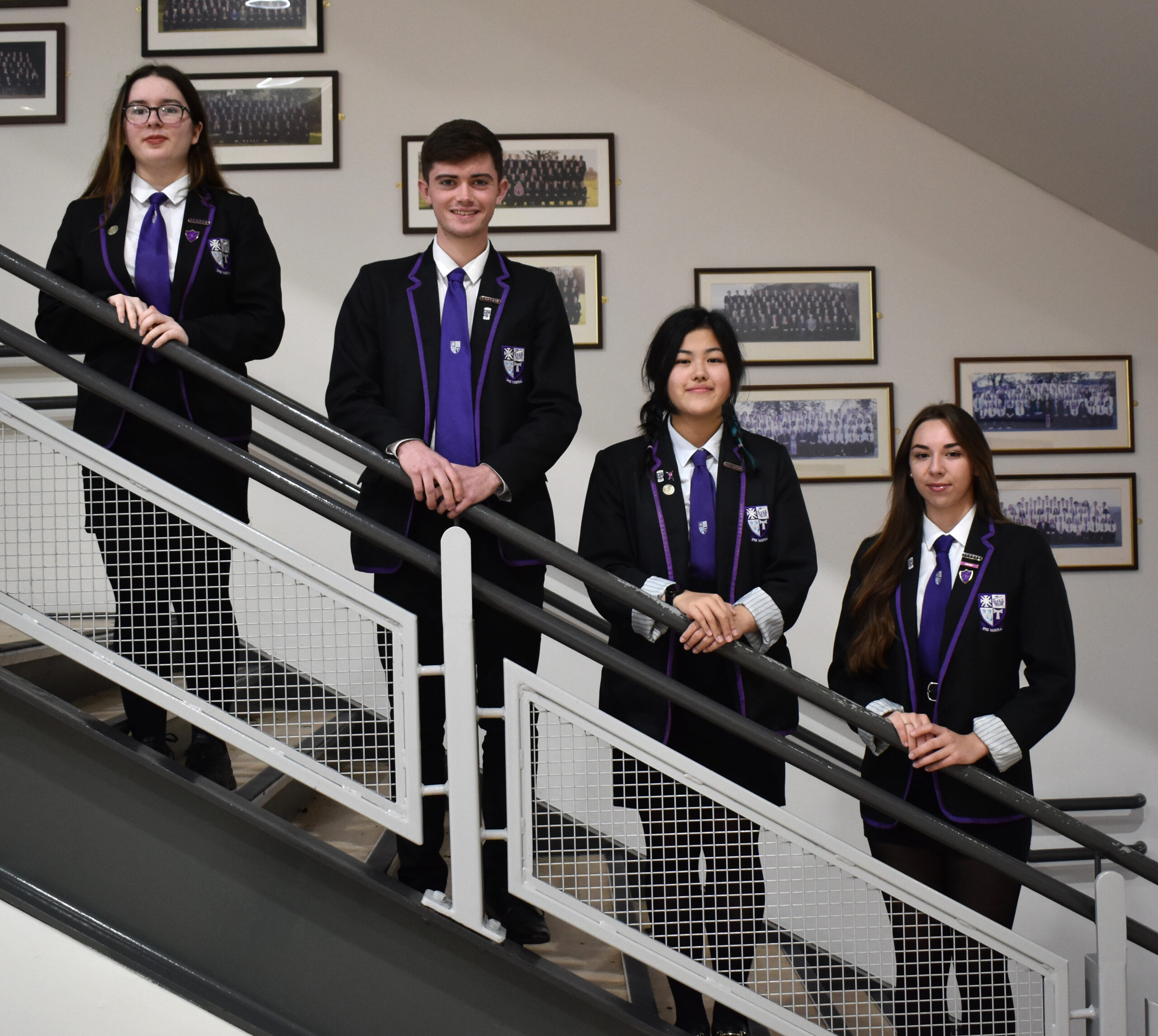 Holy Rood High School students show off their uniforms.